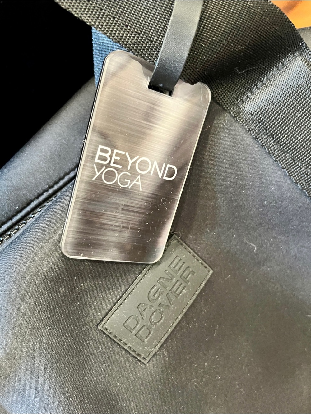 Dagne Dover Duffel with Beyond Yoga Tag